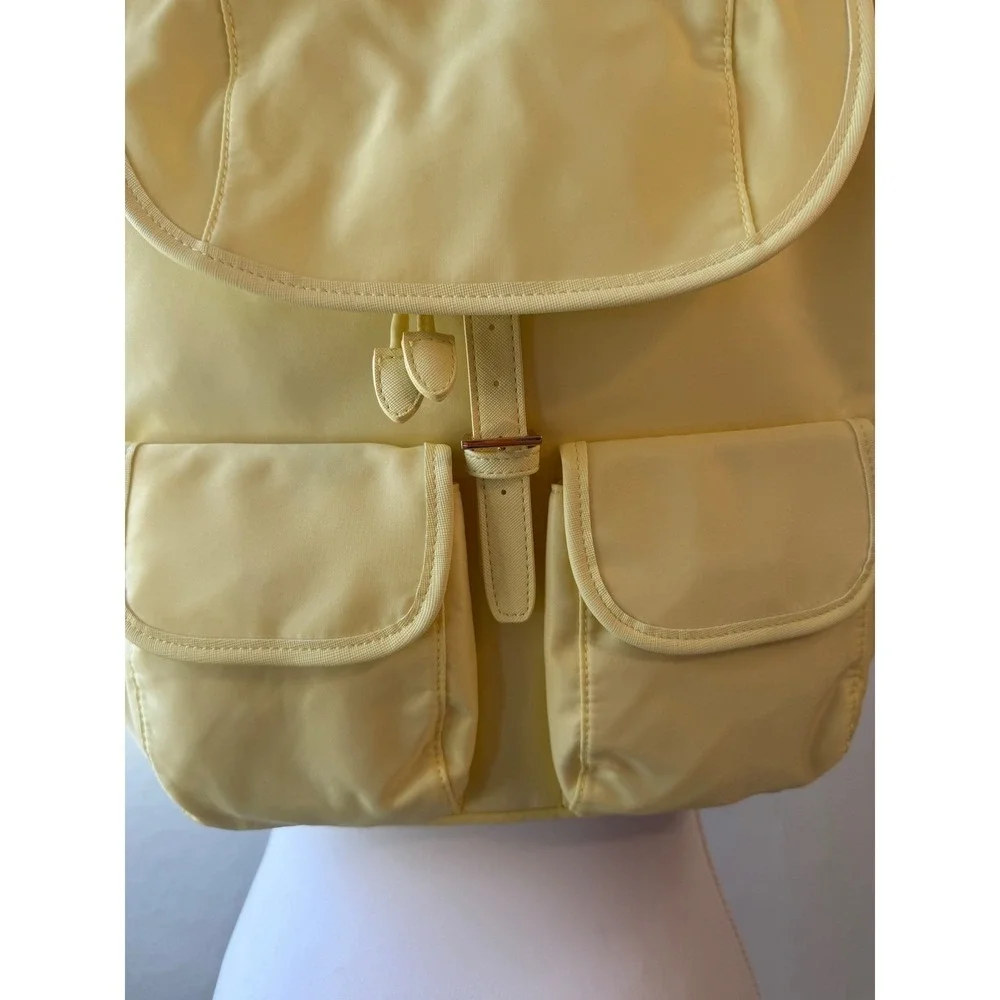 Year of Ours Nylon Backpack Pale Yellow Drawstring Buckle Flap OS NWT